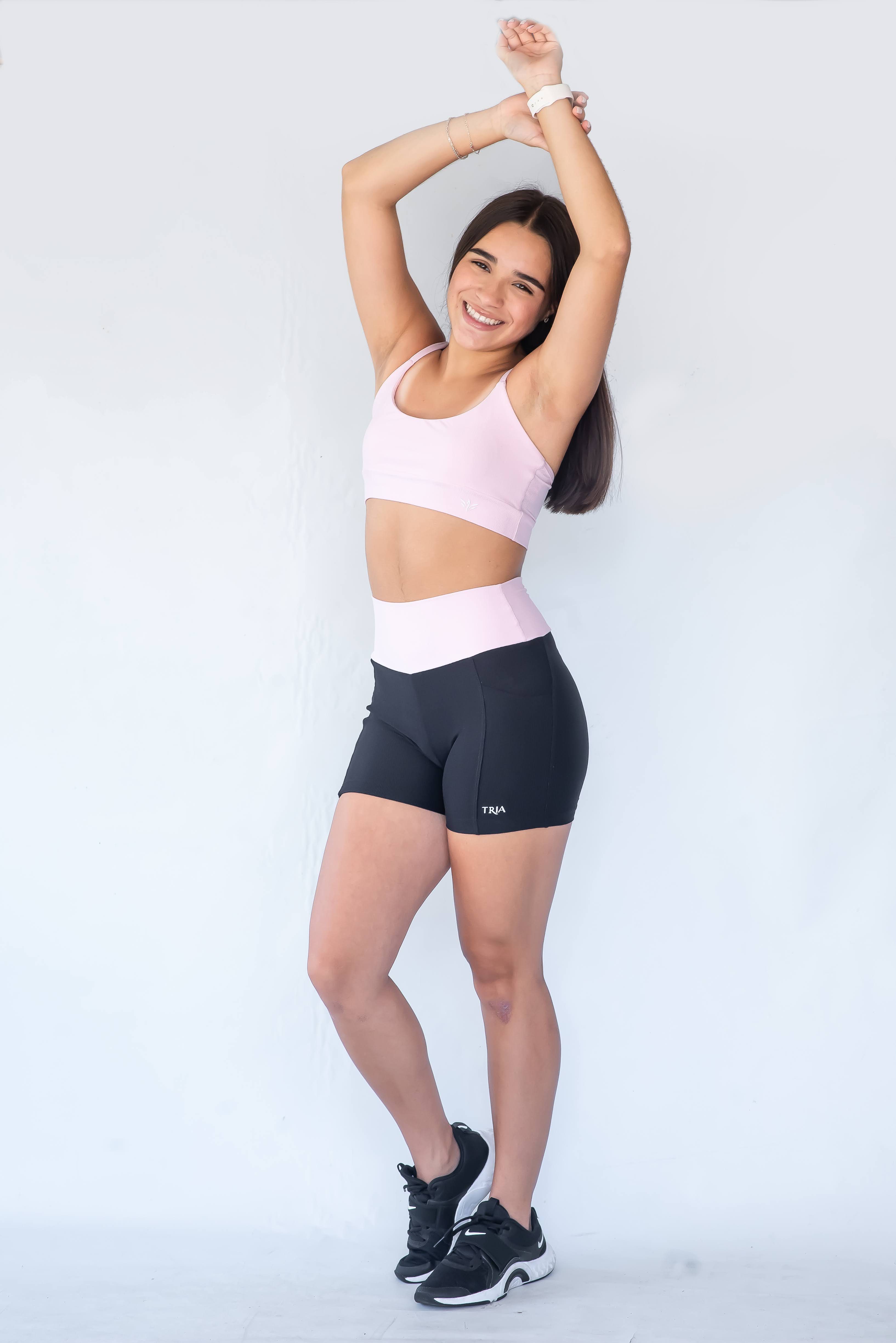 Conjunto short bolso preto com rosa bebê